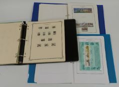 Two ring binders Christmas Island, Norfolk Island and Cocos Island stamps and an empty Scott album