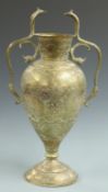 Cairo ware brass vase with engraved winged figures and serpent handles, 55cm tall