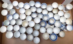 Approximately 65 egg cups, most blue and white transfer printed including Victoriana, George