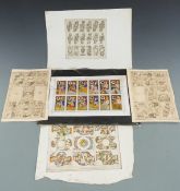 Four uncut sheets of etched and coloured playing cards by Karl Gerich including gilt examples and