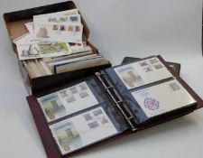 A large quantity of GB and Channel Island first day covers, loose and in albums