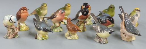A collection of Beswick birds including first version whitethroat