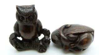 Japanese dark wood netsuke depicting a coiled octopus or squid, together with a vintage dark wood
