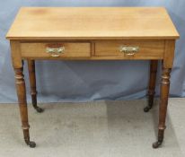 A 19th/20thc oak two drawer hall table, W92 x D48 x H75cm
