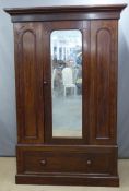 A 19thC mirrored mahogany wardrobe with two drawers, W116 x D45 x H200cm