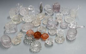 Forty cut and pressed clear and coloured glass salts