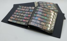 Two stockbooks of mint and used Commonwealth stamps, mainly George VI - QEII part commemorative sets