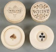 Four ivory and similar whist marker containers, two with 'Whist' to lids, all with counters
