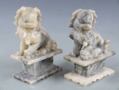Pair of Chinese alabaster Foo dogs, 17cm tall