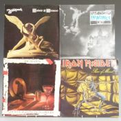 Fifteen albums with promo stamps/labels on rear cover including The Rolling Stones, Rush, Iron