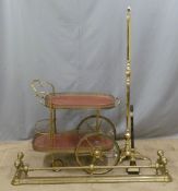 Brass fender, kitsch / mid century tea trolley, brass standard lamp and a decorative table