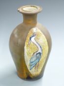 Eeles Family Pottery vase decorated with a heron, H31cm