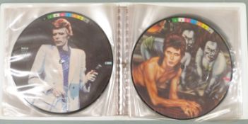 David Bowie - Fashion (BOW 100) 10 picture disc singles in book/ wallet, record appear unplayed,