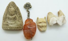 Chinese agate carving of a monkey, an ivory netsuke of a man/devil and a stone carving of Guanyin
