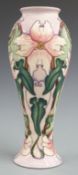 Moorcroft pedestal vase decorated with pink flowers, dated 2001 to base, H27cm