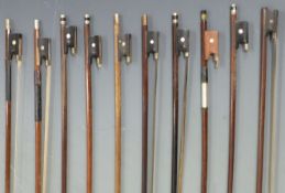 Ten various un-named violin bows, varying weights