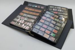 Two stockbooks of mint and used Commonwealth stamps, mainly George VI - QEII part commemorative