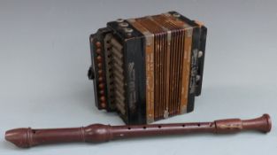 Three stop early 20thC 'Gloria' German melodeon in the key of C with ten treble buttons and two bass
