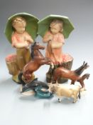 Pair of retro chalk umbrella figures, Beswick cow and German horse figures