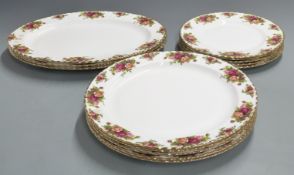A collection of Royal Albert Old Country Roses dinnerware including large plates/ platters