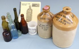 Two stoneware flagons for Smith and Son, Brimscombe, Stroud (height 32cm) and Pickup & Co Bristol,