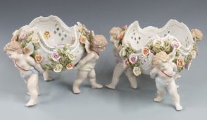 A pair of continental bowls with faux Meissen marks, H24cm