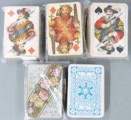 Three packs of Bernhard Dondorf playing cards two having Egyptian/Oriental scenic aces and two