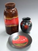 Poole pottery 'Millennium' charger, Poole vase and a mid century/retro German vase, tallest 38cm