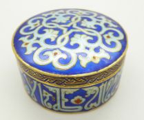 An Islamic box set with enamel in a patterned design, 8cm diameter