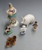 19thC Derby 'patch' figurine, 19thC Staffordshire figure of a black woman, Staffordshire cat,