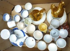 Approximately 29 named novelty egg cups including Coalport, Royal Doulton, Delft, Royal Worcester,