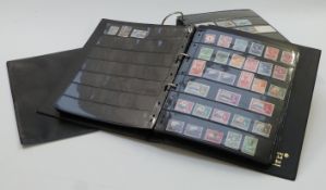 Two stockbooks of mint and used Commonwealth stamps, mainly George VI - QEII part commemorative sets