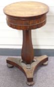 Victorian rosewood font with removable top, raised on tapering octagonal support and triform base,