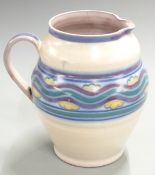 Carter Stabler Adams Poole pottery jug decorated with wavy landscape and cloud design, H20cm