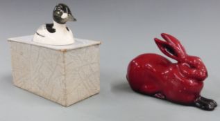 Beswick Peter Scott Goldeneye duck in original box and a Royal Doulton flambé hare, tallest 7cm