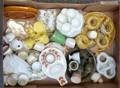 Collection of egg cruets, novelty egg cups including pottery, Goebel etc