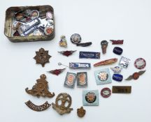 Quantity of military and motorcycling badges including silver BSA, Triumph, Norton, Middlesex,