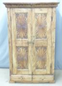 A carved Eastern hardwood cupboard, by repute originally purchased from Liberty, London, W103 x