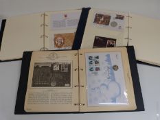 Three albums of coin / stamp covers - A Lifetime of Service - QEII Commemoration - A History of