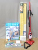 A quantity of household items including a Coca-Cola clock