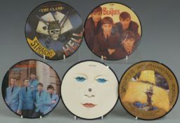 Approximately 70 picture disc singles including The Beatles, The Clash, Madness, Motorhead, The Who,