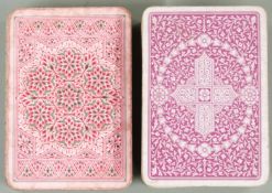 Two packs of De La Rue & Co. London playing cards, both with three pence duty aces, double ended