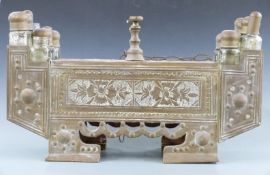 Eastern brass mounted shoeshine kit with bottles to sides and drawers to back, 66cm long