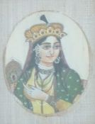 A 19thC Indian ivory portrait miniature of a lady with head dress, 8 x 6cm