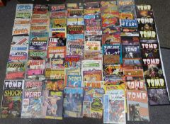 A large collection of comic books and magazines including Tomb, Weird, Nemo, Fun, Shock, Star