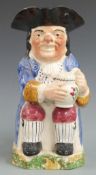 18thC / 19thC Toby jug with sponged base and back