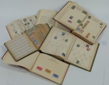 Two albums of all world stamps and an album of 1937 Coronation omnibus stamps, reference books etc
