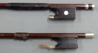 Tourte violin bow with octagonal stick, ebony frog with mother of pearl eye and three part silver
