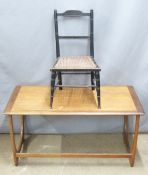 A mid century G Plan style coffee table and a child's bergère chair, the table W99 x D50 x H53cm