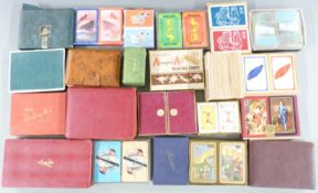Approximately 25 double packs of playing cards including shipping, patience, Coral